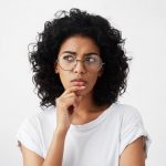 Questioning Dental Patient Wondering About Dental Implant Procedures