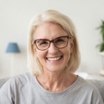 Dental Patient Smiling With Her Dental Implants