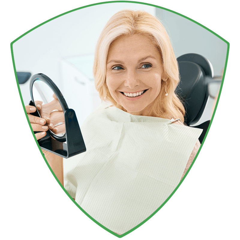 dental patient new smile with mirror