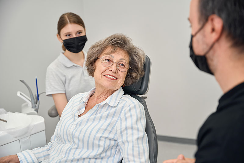 lady replacing tooth