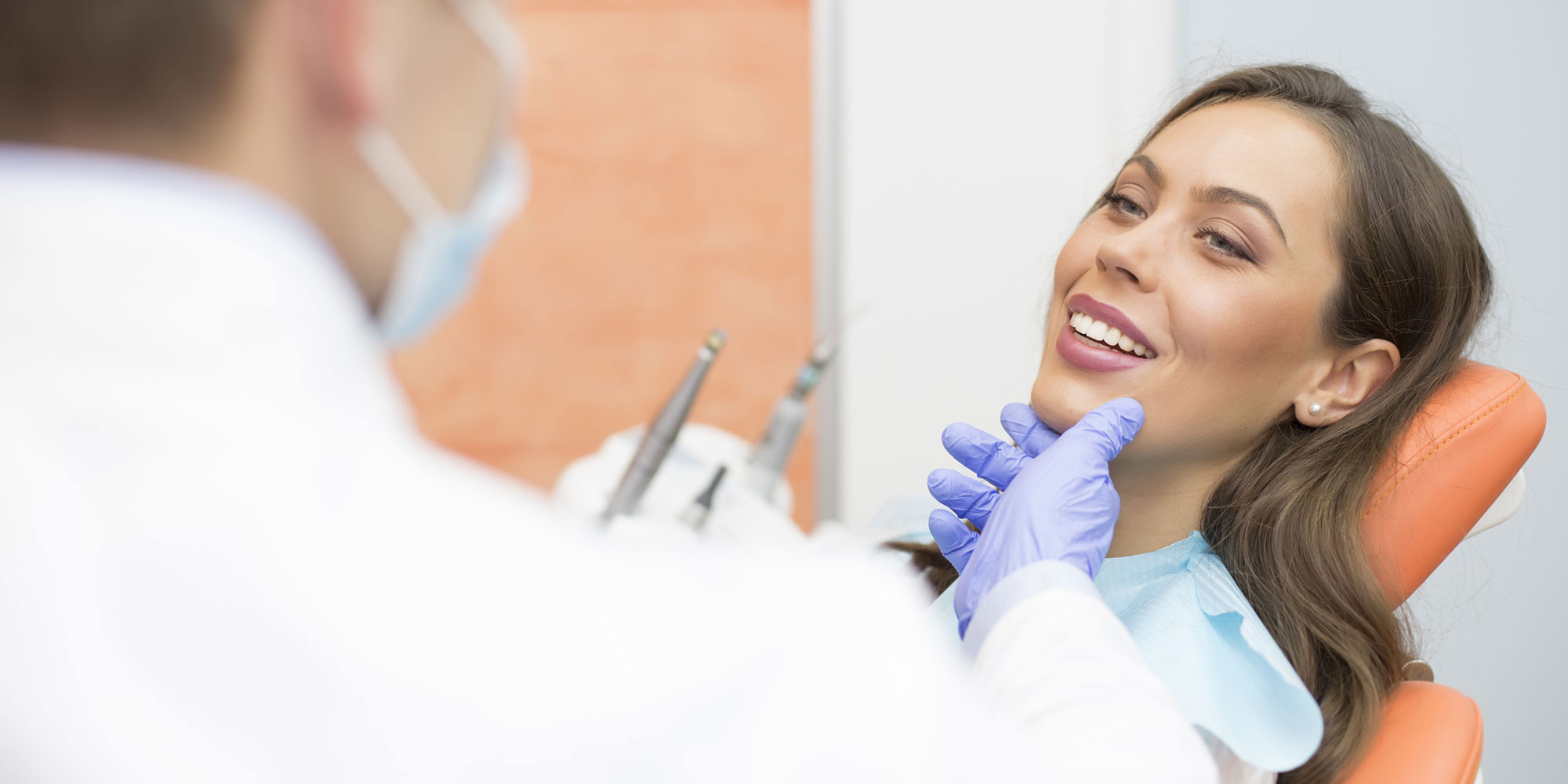 dental patient with dentist during consult