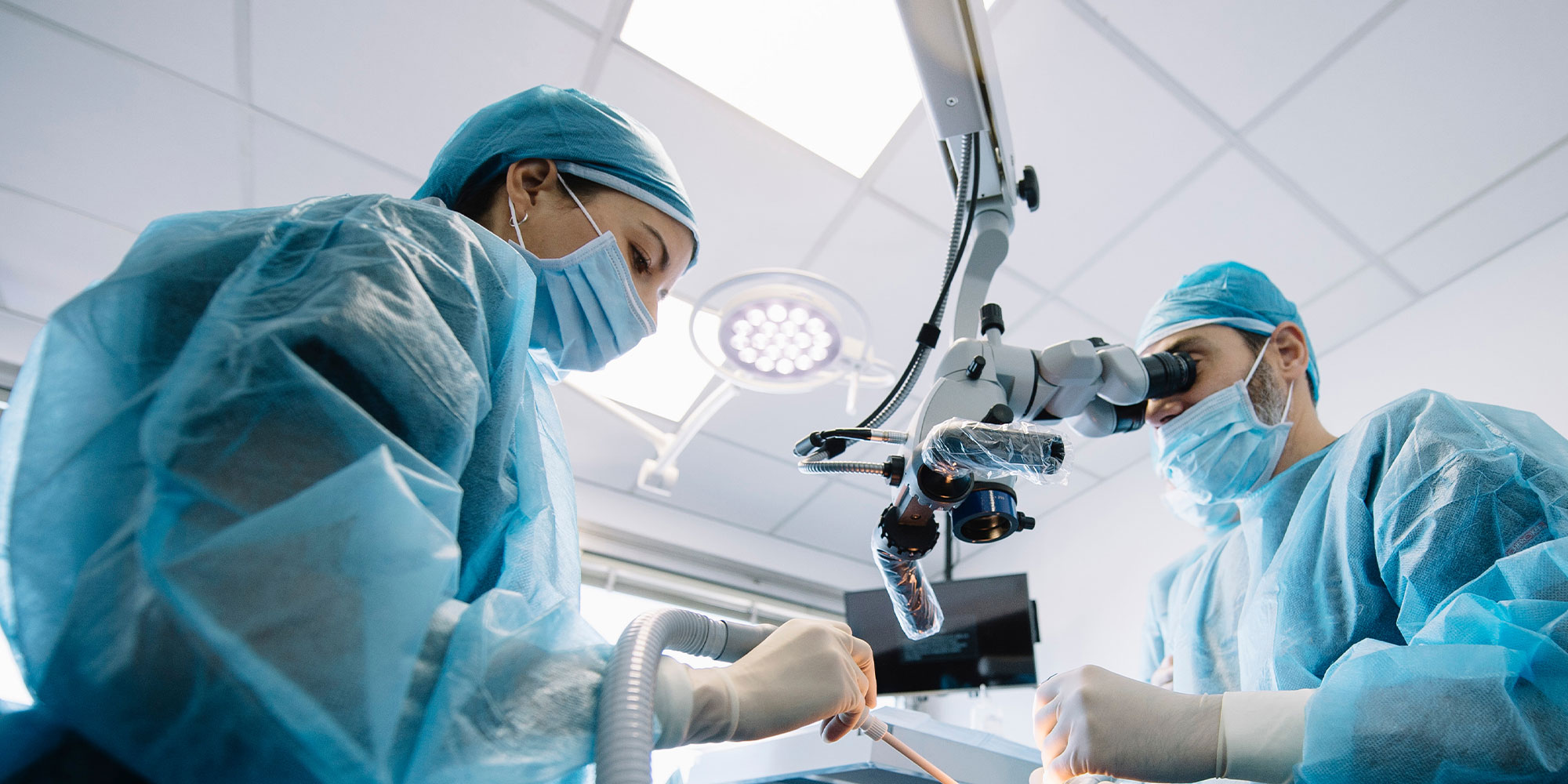 doctor using robot to help during surgery