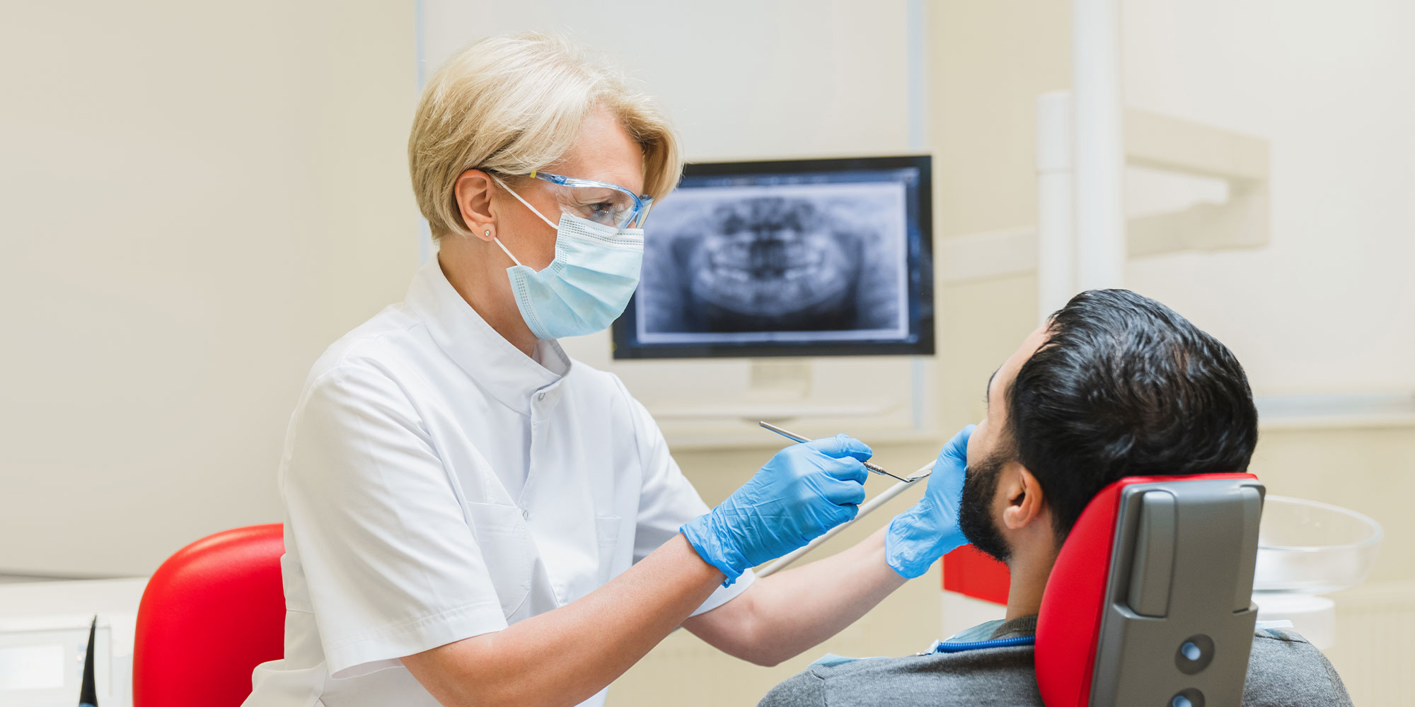 dr with patient during pinhole surgery
