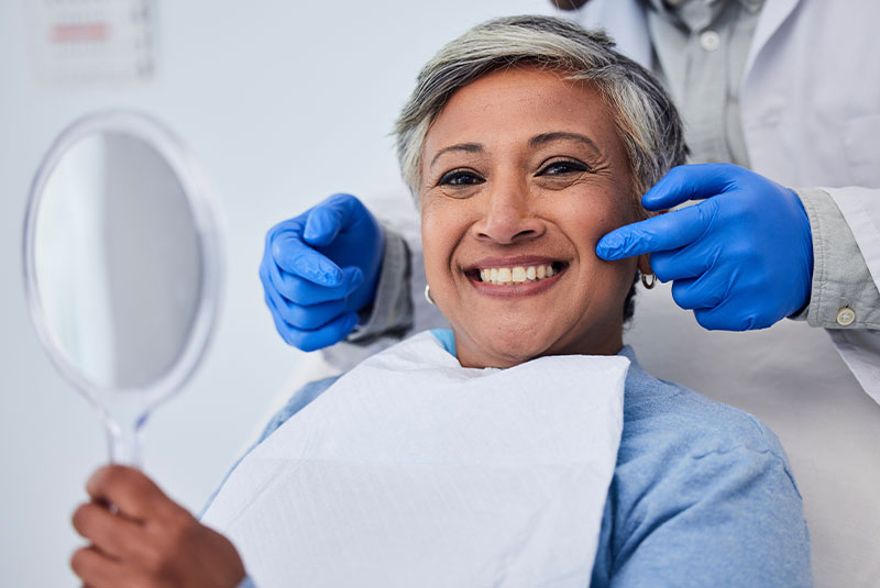 smiling new dental implant patient